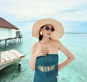 Lã Thanh Huyền’s Stunning Vacation Style: The Sheer Dress Trend - image 7