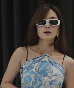 Thiều Bảo Trâm's Sister Sets Summer Trends with a Bold Scarf Top Fashion Statement - image 1