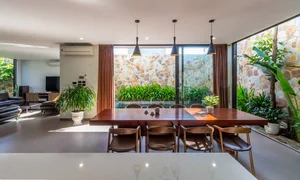 6 Inspiring Modern Townhouse Designs Featuring Lush Indoor Gardens, Natural Light, and Sustainable Biophilic Architecture for a Refreshing Urban Oasis - image 24