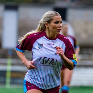 Beauty in Motion: Celebrating the Athletic Elegance and Fierce Spirit of Modern Football Stars - image 2
