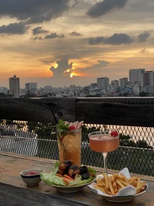 Top Rooftop Cafes in HCMC to Watch the New Metro Line - image 6