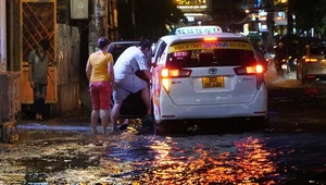 Exploring Ho Chi Minh City in the Rain: Locals and Tourists Embrace the Weekend Despite Stormy Weather - image 16