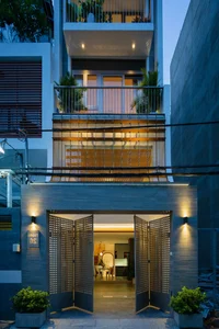 Architectural Gem: A Minimalist 65m2 Tube House in District 7 Optimized for Light and Space - image 2