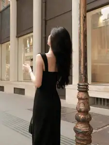 Elegant Black Dress: Modern Muse Captivating All Eyes on the Street - image 9