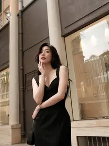 Elegant Black Dress: Modern Muse Captivating All Eyes on the Street - image 4