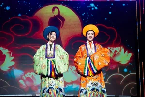 Royal Elegance: Modern Ao Dai Inspired by Empress Nam Phuong - image 3