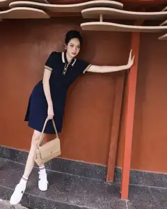 VGU No.181: Urban Muse Embraces Modern Elegance with Polo Dress and Chic Sneakers - image 0