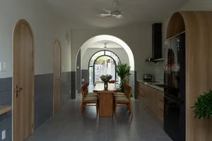 Elegant 2-Story Townhouse Design Featuring Stunning Arched Architectural Accents - image 0