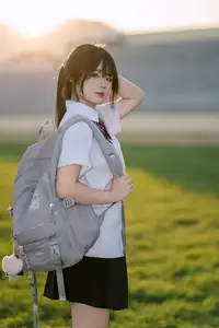 Youthful Schoolgirl in Uniform: Serene Golden Hour Beauty, a Glimpse into Nostalgic Student Life. - image 0