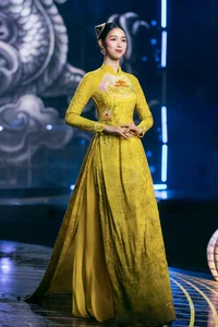 Designer Do Trinh Hoai Nam Transforms Yen Bai Gemstone Art into Luxurious Ao Dai - image 4