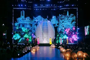 Designer Do Trinh Hoai Nam Transforms Yen Bai Gemstone Art into Luxurious Ao Dai - image 0