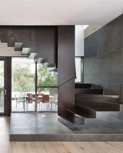 Modern 2-Story Townhouse Design Featuring Cantilevered Floors for Seamless Indoor-Outdoor Living - image 11