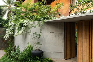 Sustainable 3-Story Home Featuring Traditional Coconut Wood Roofing and Local Architecture - image 16