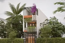 A Hanoi house in a narrow alley filled with natural light and ventilation - image 9