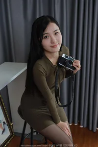 Wan Ping as the Beautiful Photographer: A Professional IESS Portrait Series - image 3