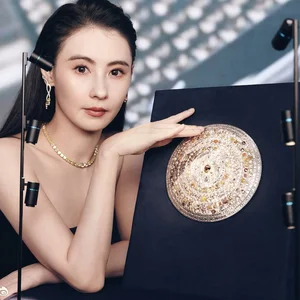 Style Icon Cecilia Cheung Shines in Exquisite Gold Dress by Vietnamese Designer - image 0