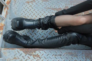 Chic Winter Trends: IESS Tutu Featuring Black Silk Stockings and Stylish Long Boots - image 4