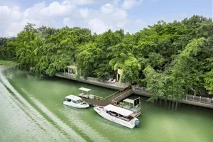 Tropical Riverside Escape: A Lush Forest Resort Near Ho Chi Minh City - image 0